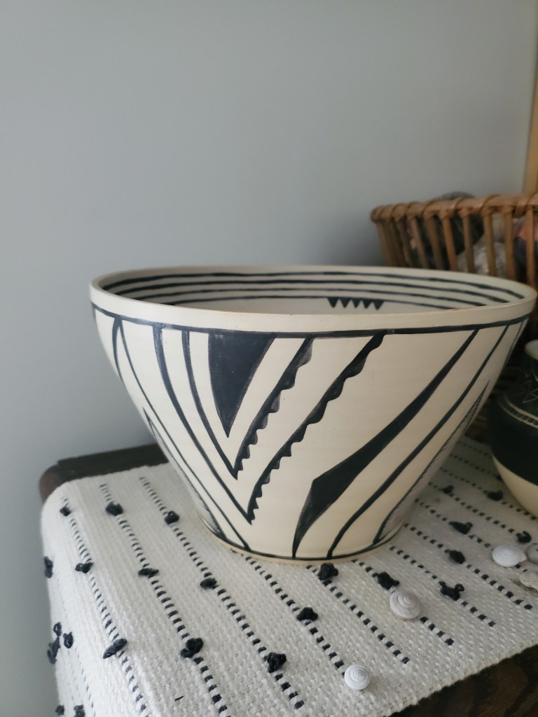 Anasazi inspired collab with my husband- he thew the pot and I glazed. Also pictured hand-woven table runner by me! 